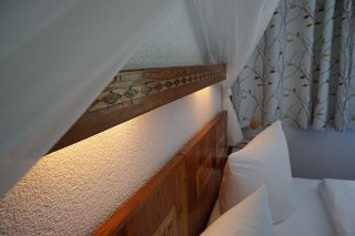 5_pension_strolz_bichlbach_zimmer_bett.jpg